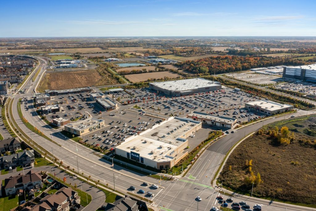 Aerial view of a commercial retail property illustrating shopping-center real estate, not a Phillips Edison property