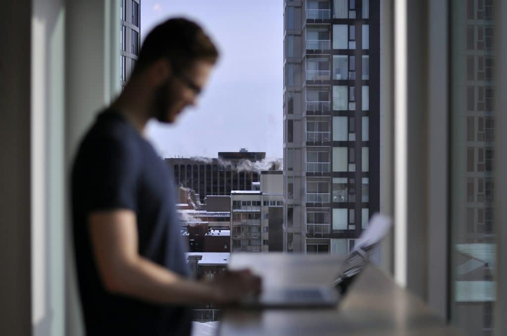 Computer workspace illustrating property management software; not DoorLoop's actual user interface