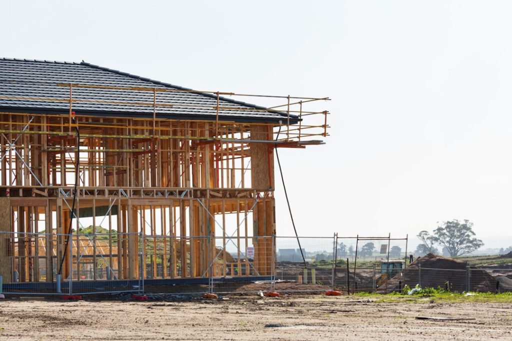 Factory-built housing construction illustrating HUD's NIBS multifamily initiative; representative image