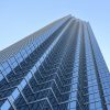 Modern glass commercial tower representing the banking sector; illustrative, not a First Financial or Finward building