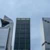 Financial district office towers illustrating mortgage lender leverage and capital market risks