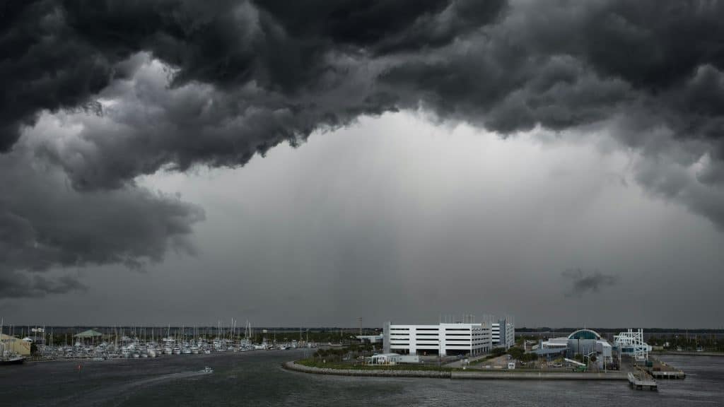 Dark storm clouds over Port Canaveral, Florida; illustrative image, not a photograph of Hurricane Isaias