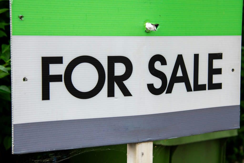 For-sale sign illustrating changing U.S. home asking prices