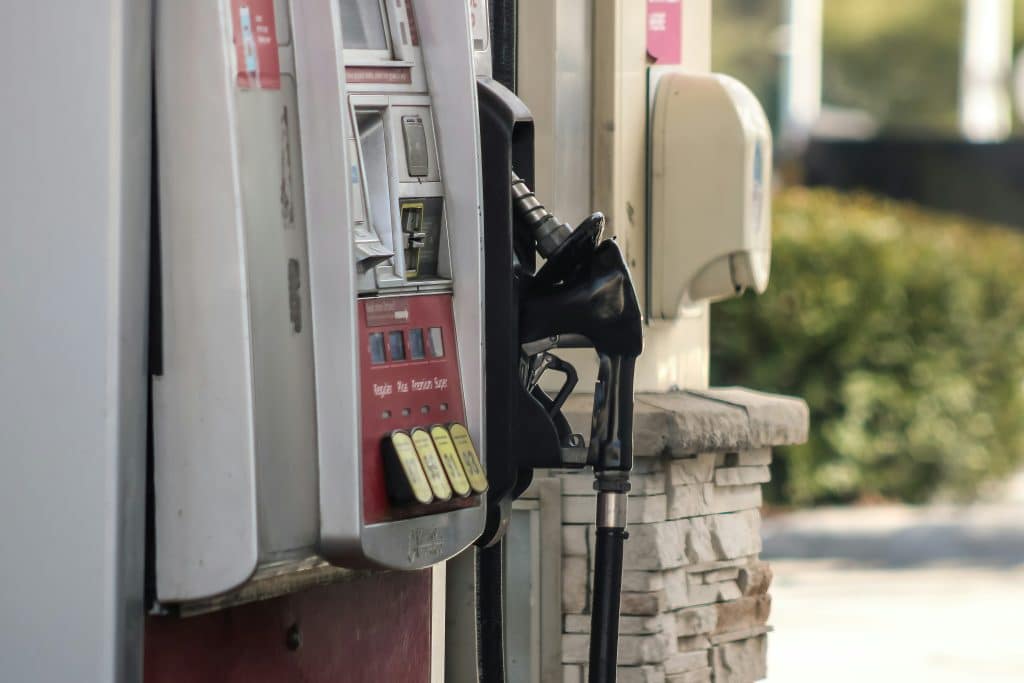 Gasoline pump at a fuel station illustrating inflation and rising energy costs