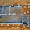 Aerial view of residential construction illustrating HUD manufactured housing modernization