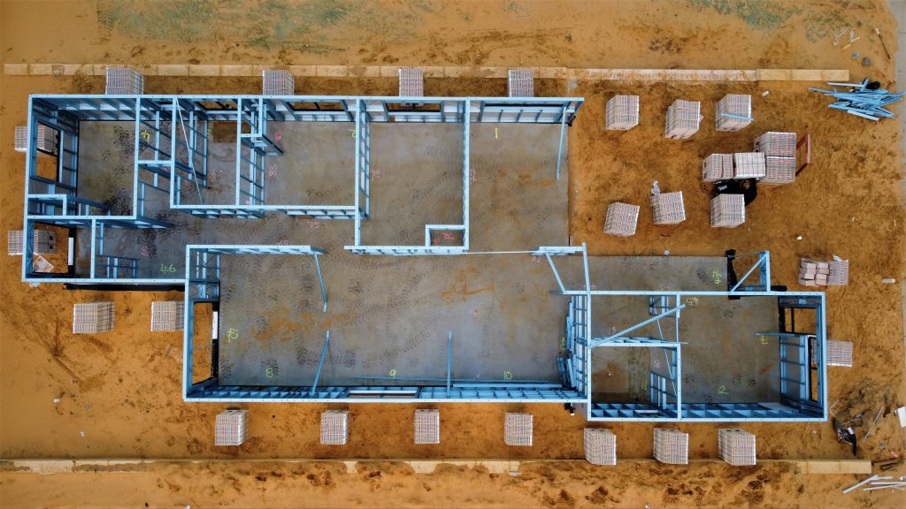 Aerial view of residential construction illustrating HUD manufactured housing modernization