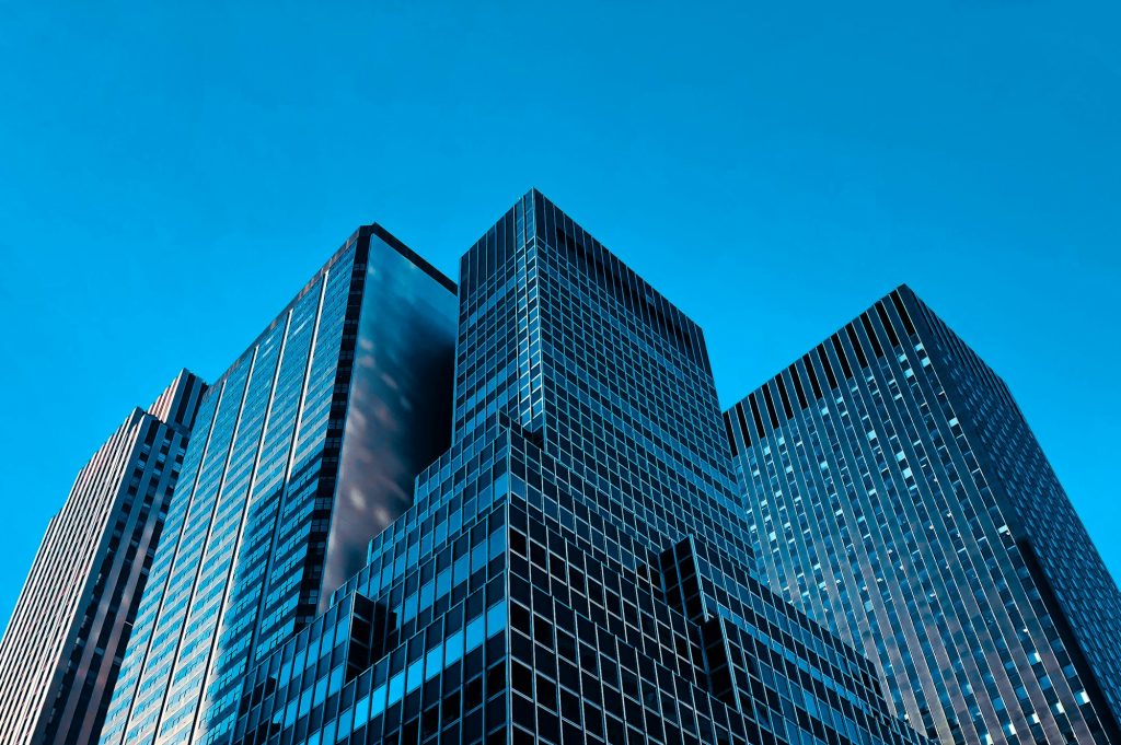 Modern high-rise commercial office buildings, illustrating the commercial mortgage lending market