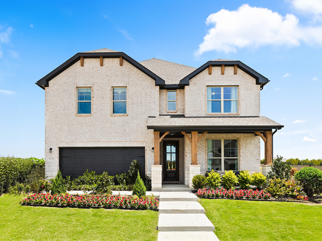 Two-story brick home pictured on HistoryMaker Homes' Dallas-Fort Worth website