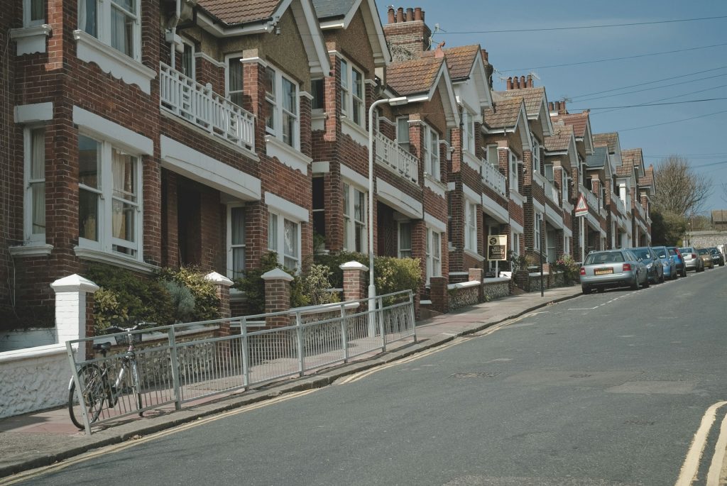 Row of homes along a street in Brighton, England, illustrating the UK first-time buyer and affordable housing budget