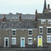 Residential building illustrating falling UK mortgage approvals and remortgaging activity