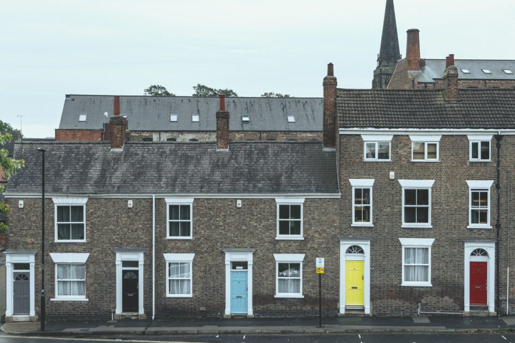 Residential building illustrating falling UK mortgage approvals and remortgaging activity