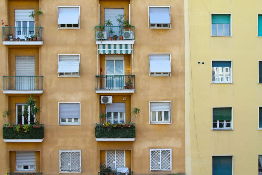 Residential apartment windows in Rome, illustrative image for European Central Bank mortgage demand research