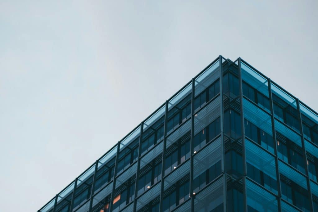 Glass-fronted commercial office building, illustrative image for Fannie Mae quarterly earnings and mortgage finance