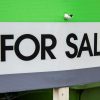 Illustrative real estate listing sign, not an actual OneKey or Compass listing