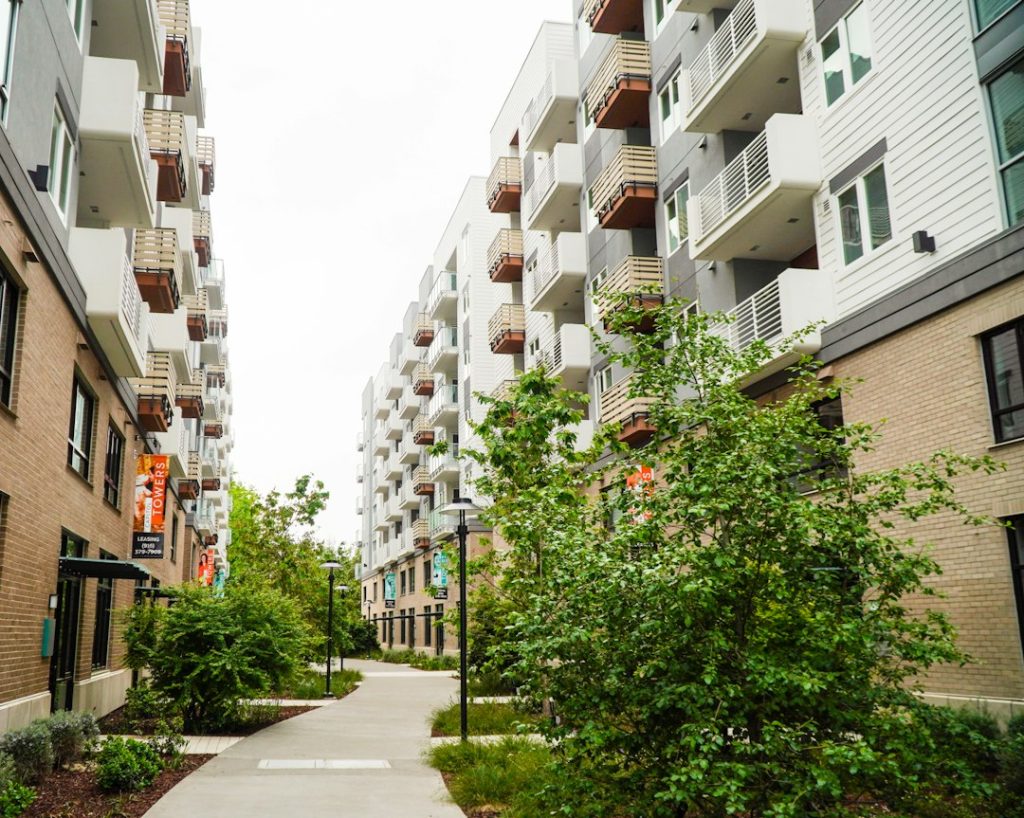 Illustrative residential buildings, not an identified Davidson Kempner ReNew portfolio property