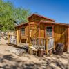 Illustrative small wooden home, not identified as a Cavco manufactured home