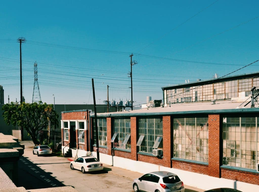 Industrial property exterior illustrating a commercial flex-building acquisition in California