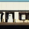 Illustrative industrial warehouse loading docks, not Speedway Commerce Center