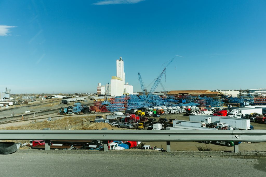 Industrial complex and yard illustrating outdoor storage advisory practice, not a Newmark client property