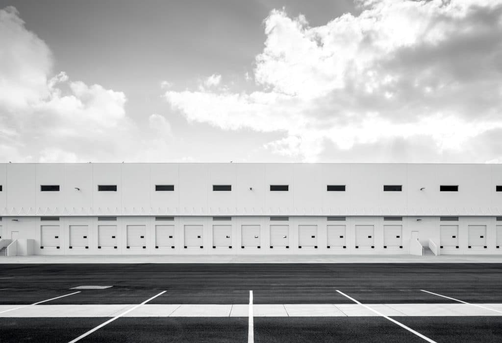 Industrial warehouse illustrating First Industrial earnings, not an identified First Industrial property