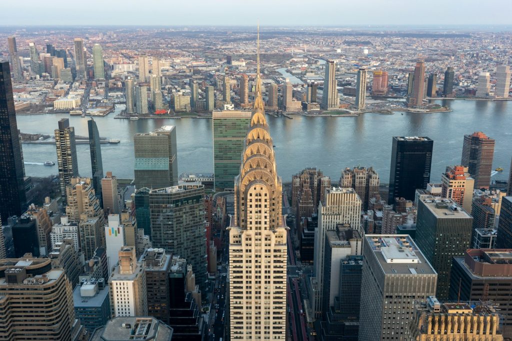Manhattan office skyline photographed from SUMMIT One Vanderbilt, illustrating U.S. office investment