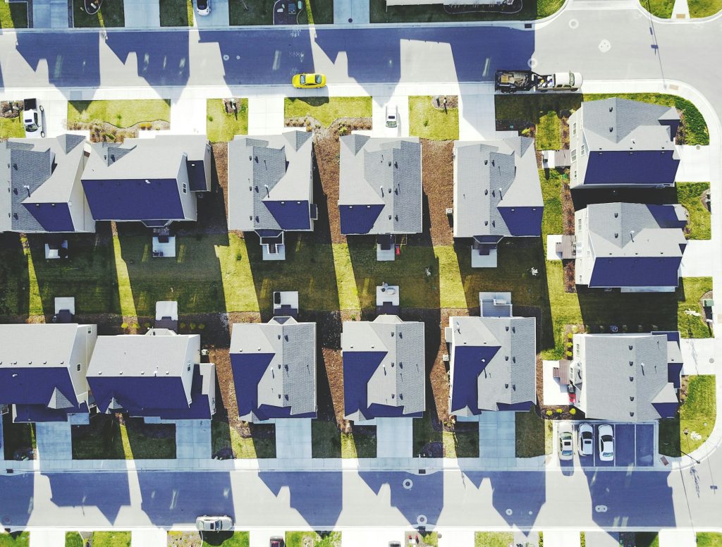 Aerial neighborhood housing illustration, not the RHP Redwood portfolio