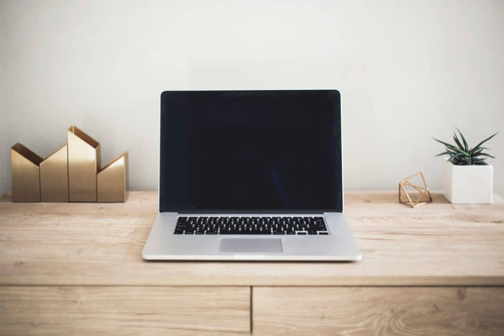 Laptop workspace, illustrative image for mortgage technology leadership and AI