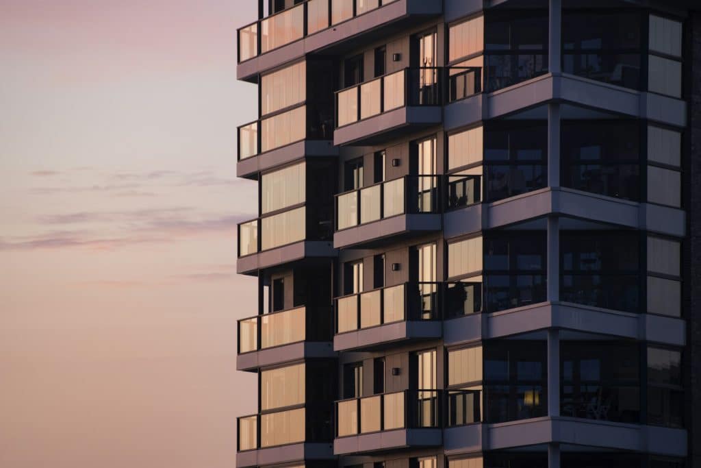 Apartment building exterior illustrating floating-rate multifamily debt, not an identified Texas property