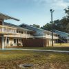 Senior housing community exterior illustrating National Health Investors' six-community acquisition