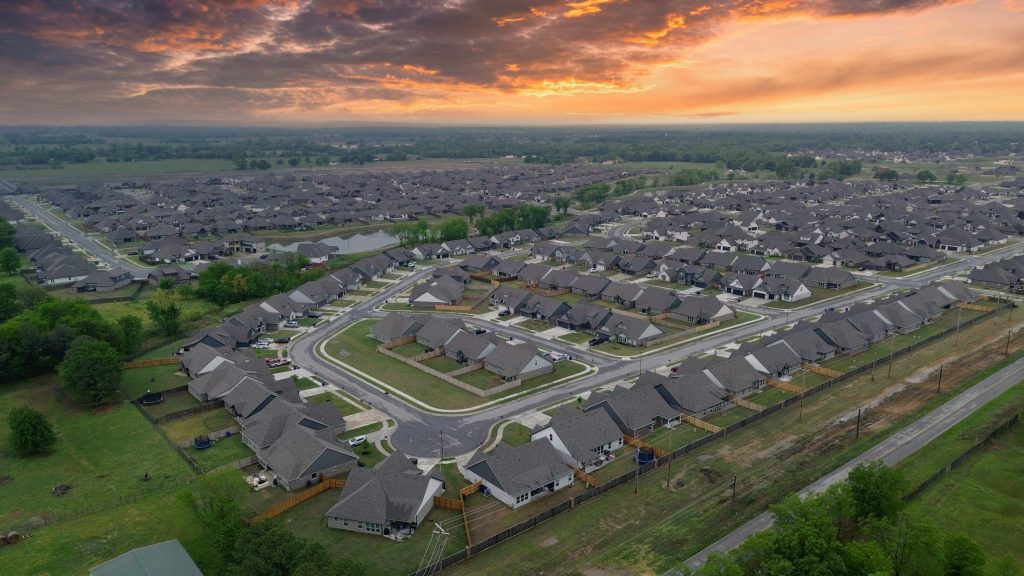 Aerial view of a suburban new-home development, illustrating national homebuilder demand