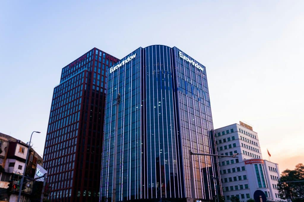 City apartment buildings illustrating multifamily property management, not a LyvWell property