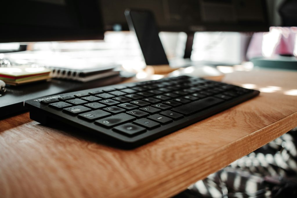 Office computer workspace representing title industry vendor cybersecurity and information security