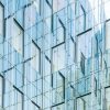Modern office building illustrating corporate employment litigation, not a Compass or REMAX office