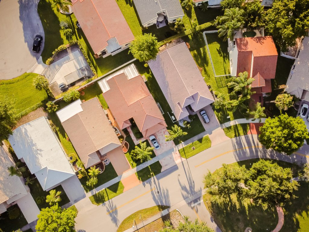 Aerial view of residential neighborhood, representative image for Florida title agency expansion
