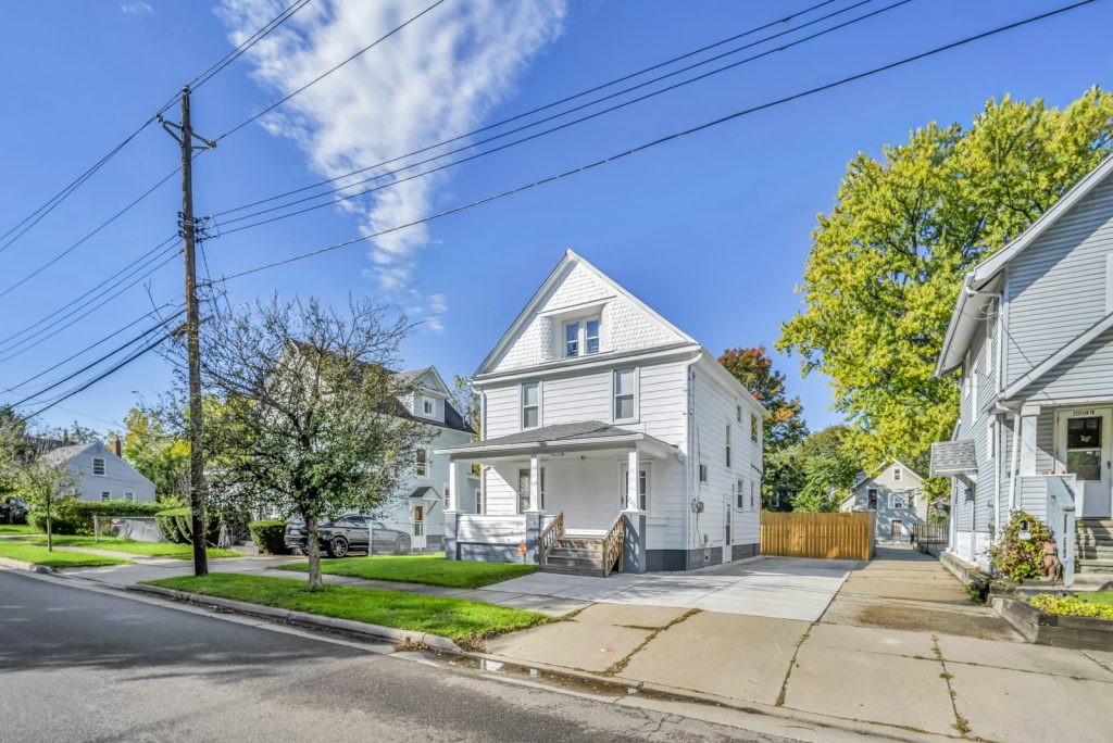 Suburban home exterior illustrating Opendoor's residential real estate business; not an Opendoor-owned property