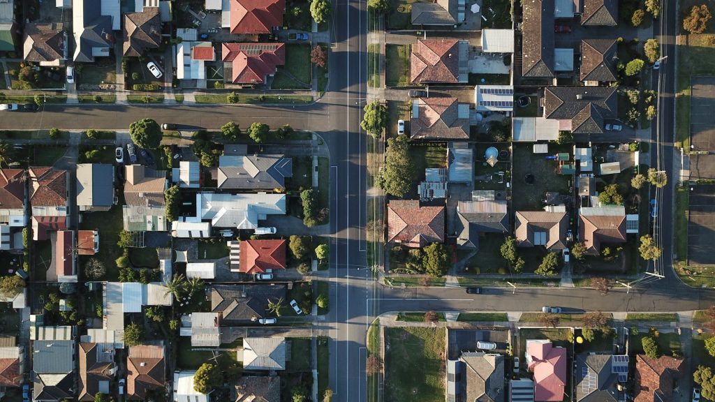 Aerial view of residential streets and homes illustrating the mortgage loans in First Horizon's planned portfolio sale