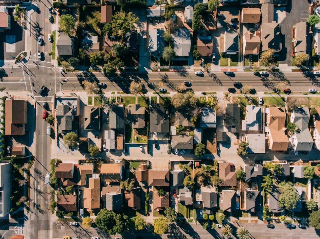 Illustrative aerial view of residential neighborhood for California housing market report