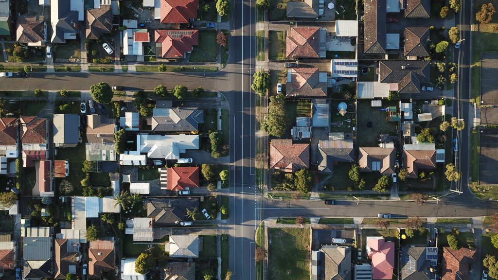 Aerial view of residential neighborhood, illustrative of housing lending