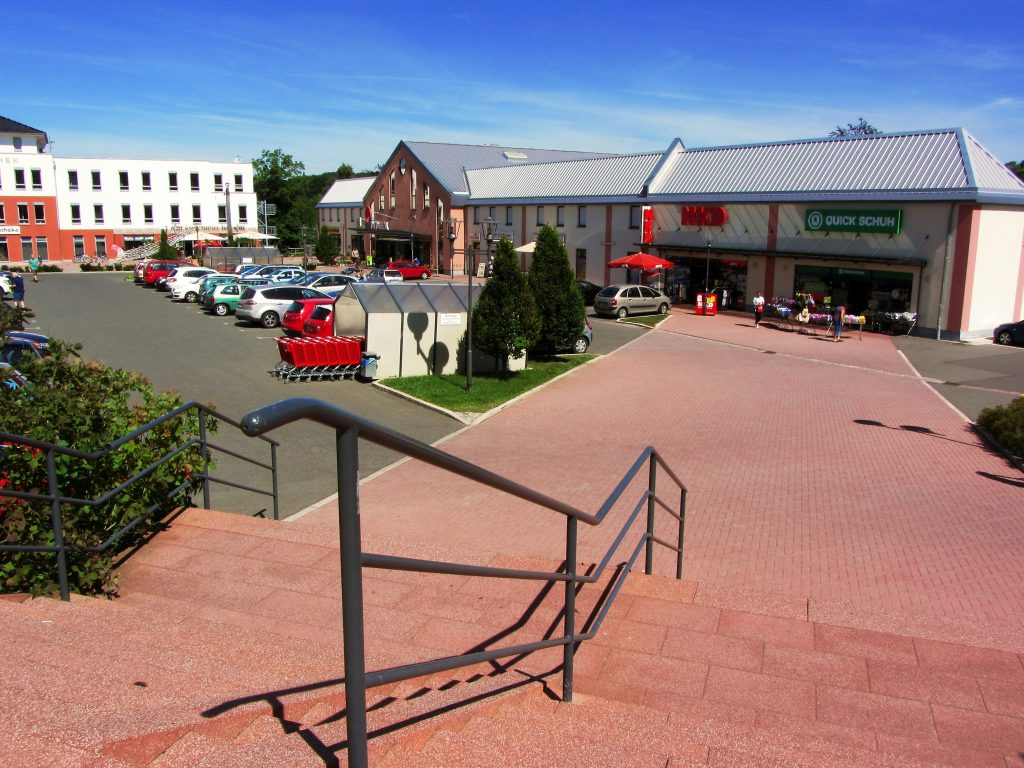 Shopping center exterior, illustrative photo not one of the Pine Tree acquired properties