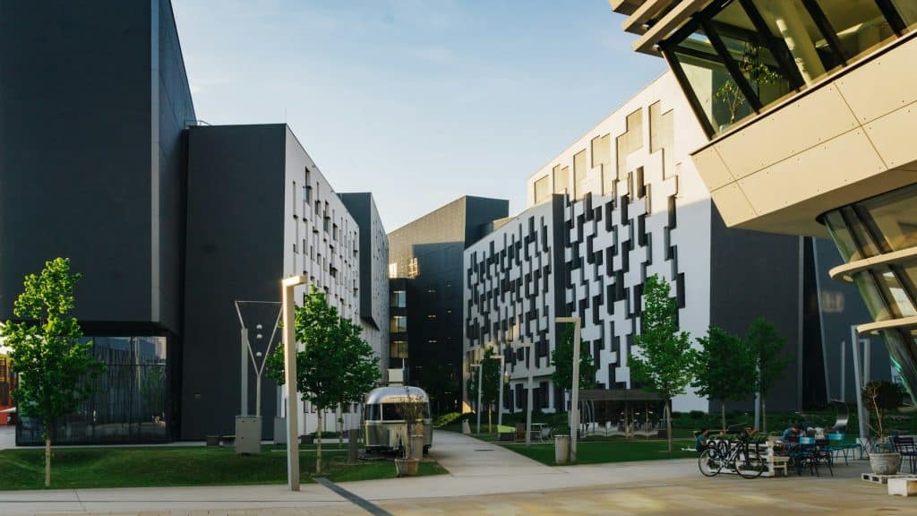 College campus exterior illustrating student housing development, not the Den at Eight50 West