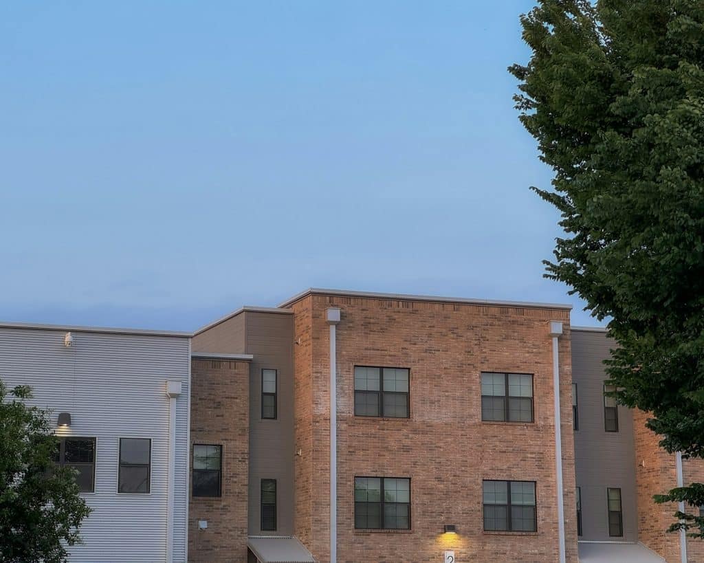 Modern residential buildings illustrating a planned Texas age-restricted development