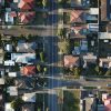 Aerial view of suburban homes and streets illustrating the U.S. housing market outlook
