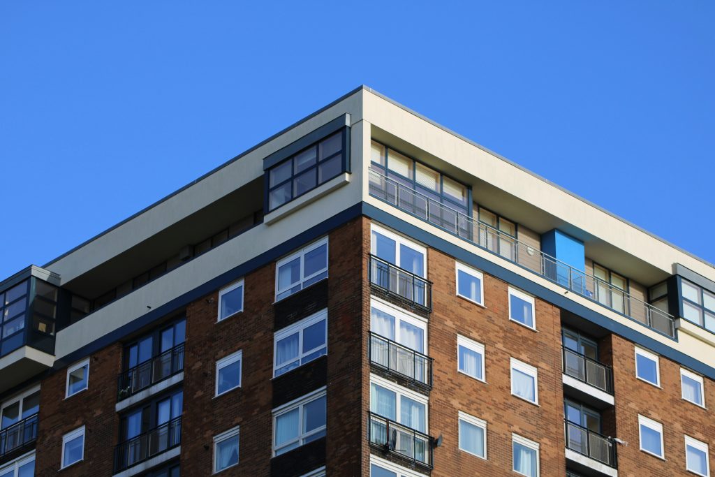 Modern residential building illustrating CareTrust REIT's expansion into UK care homes
