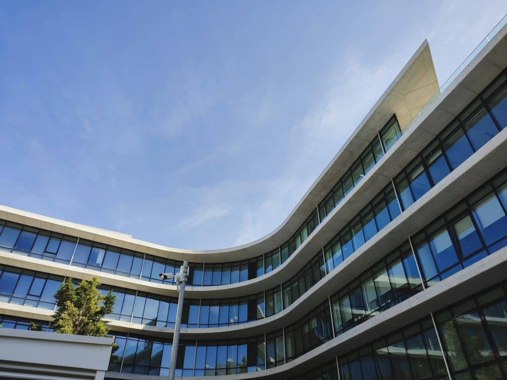 Modern concrete building illustrating commercial life sciences development, not the Moffitt facility