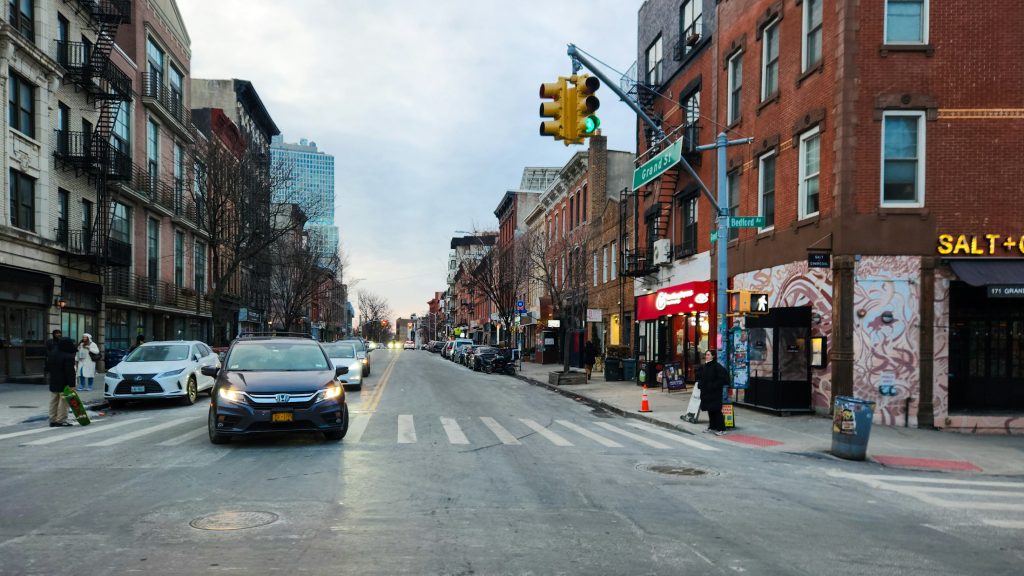 New York apartment blocks illustrating rent-regulated multifamily loan exposure